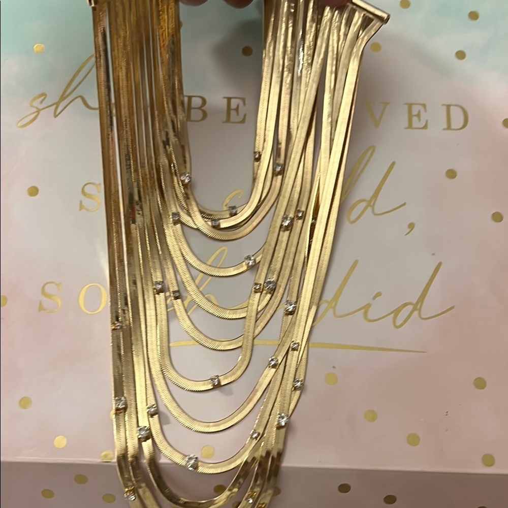 Elegant Gold Necklace with Silver Accents